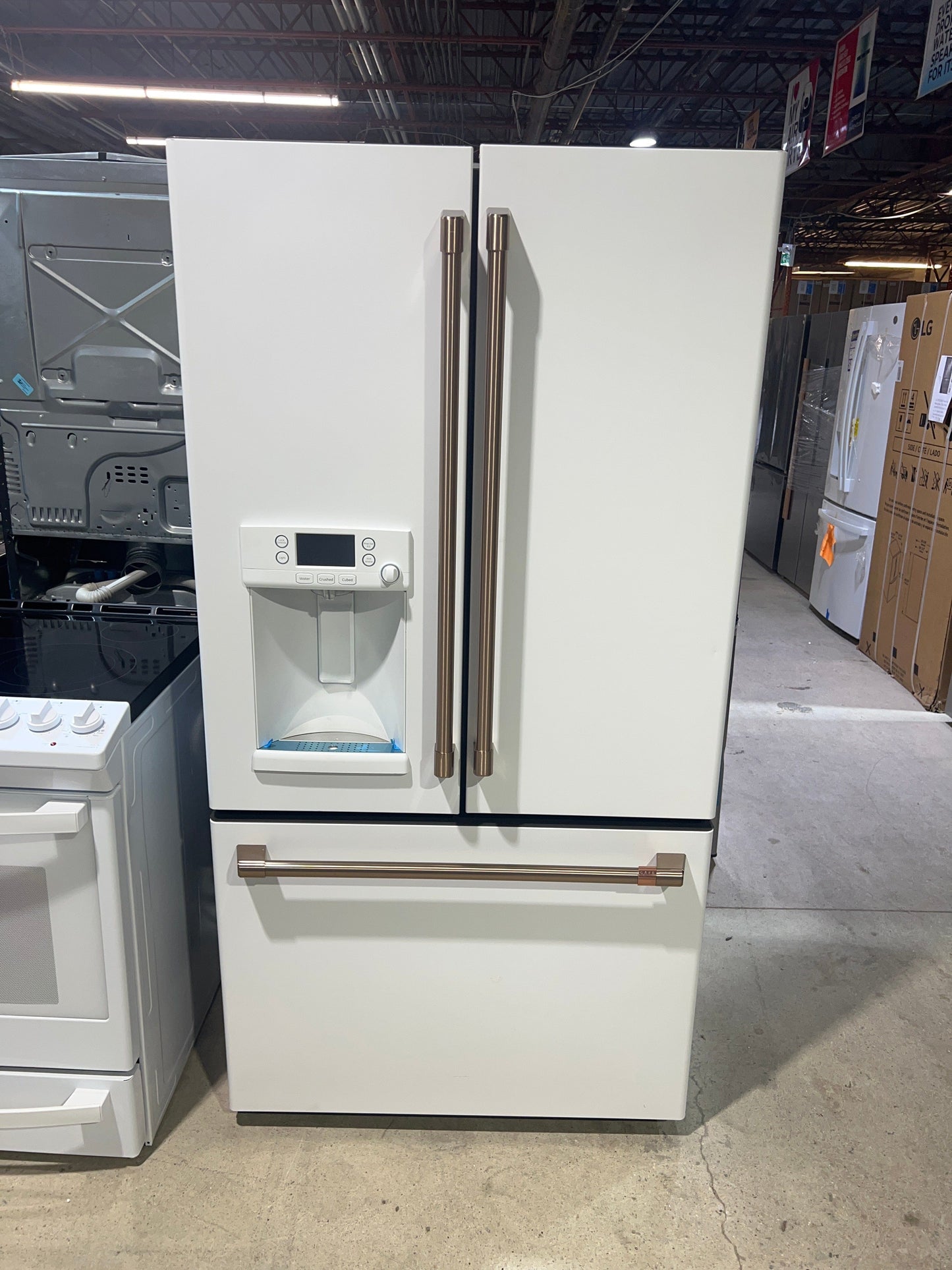 Cafe CYE22TP4MW2 French Door Refrigerator, 36 inch Width, ENERGY STAR Certified, 22.1 cu. ft. Capacity, Counter Depth, Water Dispenser (Exterior), Ice Dispenser (Thru Door), Matte White color Hot Water Dispenser ,Frost Guard. Refurbished