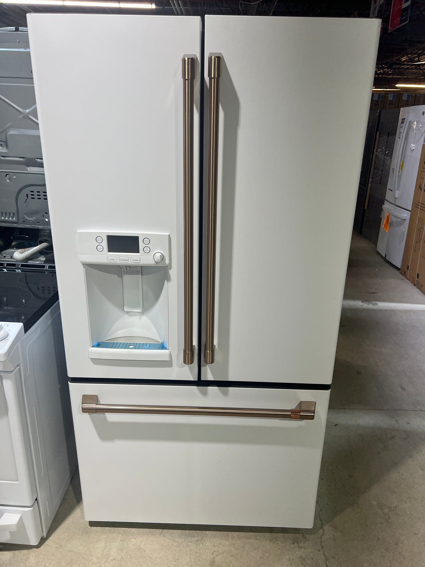 Cafe CYE22TP4MW2 French Door Refrigerator, 36 inch Width, ENERGY STAR Certified, 22.1 cu. ft. Capacity, Counter Depth, Water Dispenser (Exterior), Ice Dispenser (Thru Door), Matte White color Hot Water Dispenser ,Frost Guard. Refurbished