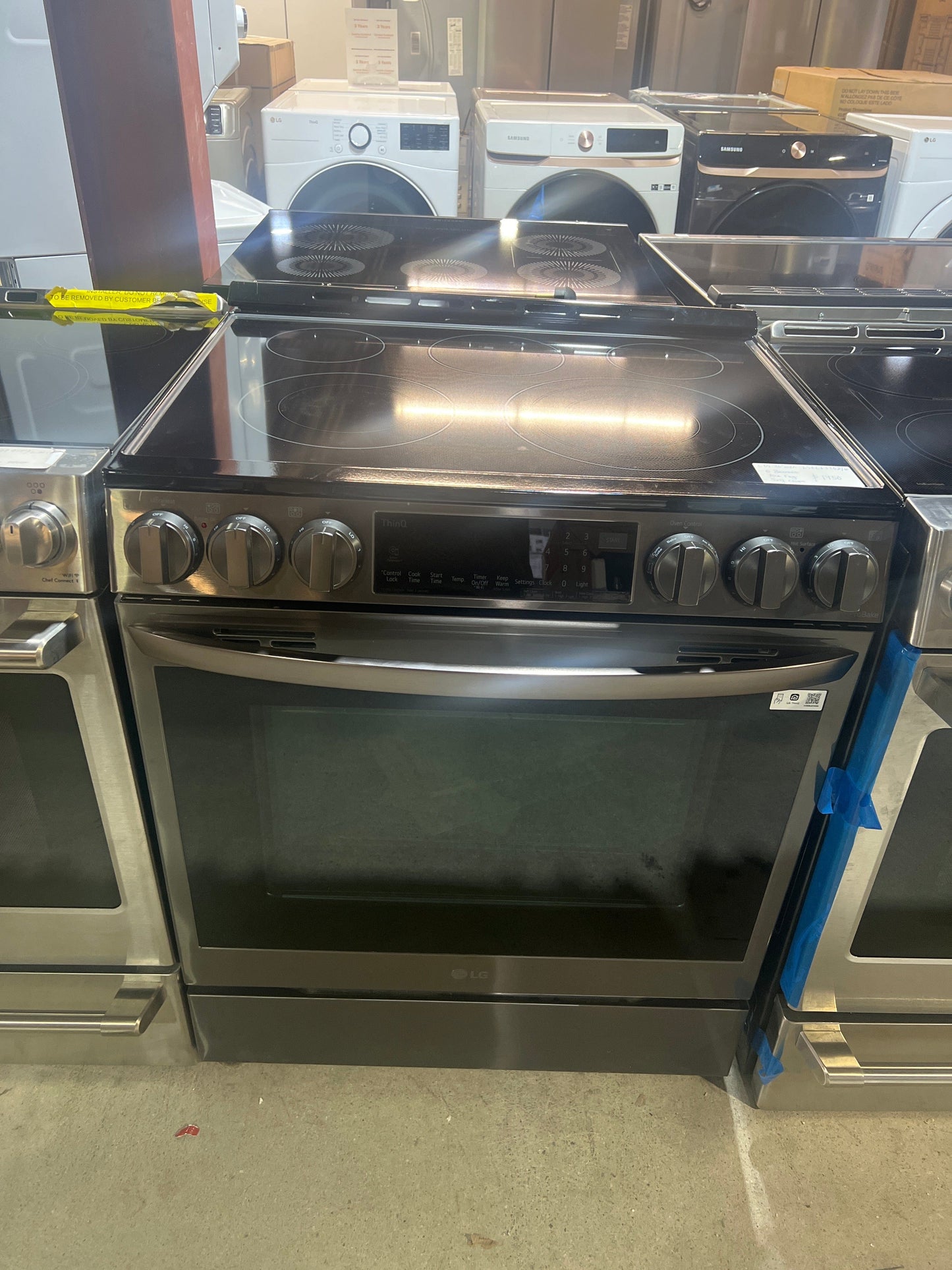 LG LSEL6335D Range, Electric, 30 inch Exterior Width, Self Clean, Convection, 5 Burners, 6.3 cu. ft. Capacity, Storage Drawer, Air Fry, 1 Ovens, Black Stainless Steel colour.  Open box 1 year warranty