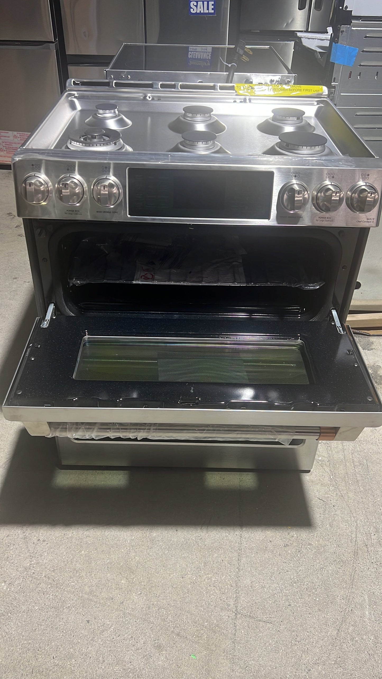 Cafe CCGS750P2MS1 Gas Range, 30 inch Exterior Width, Self Clean, Convection, 6 Burners, 7.0 cu. ft. Capacity, 2 Ovens, Stainless Steel colour True European Convection, Self Clean Racks, Griddle