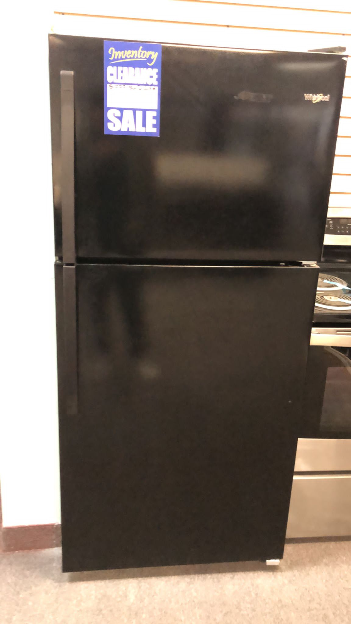 "Whirlpool WRT318FZDB 30" Top Mount Refrigerator: 18.2 cu. ft., Optional Ice Maker, Interior Light, Black"